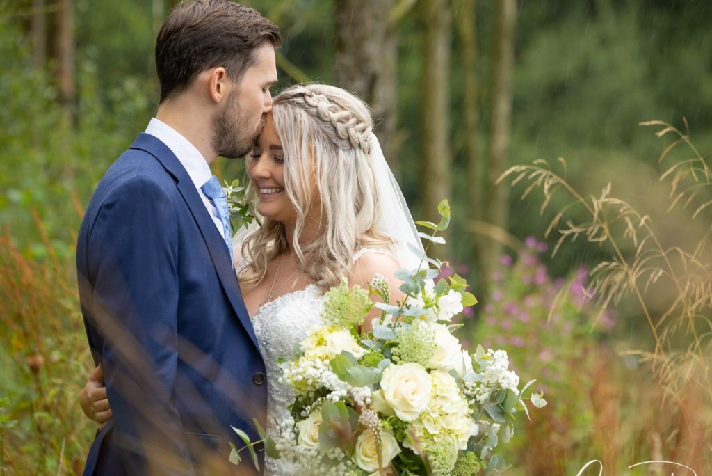 wedding couple just married in Derbyshire Peak District woodland