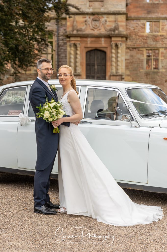Rufford Abbey Mill wedding couple with vintage car