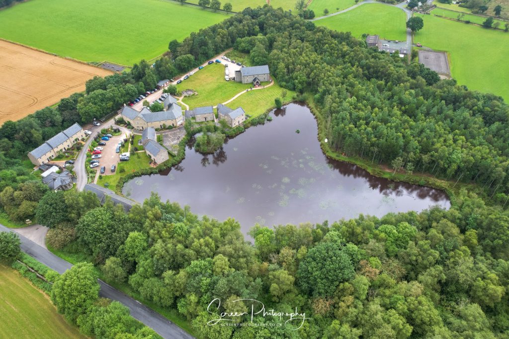 Darwin Lake Holiday Village in forest from drone near Two Dales