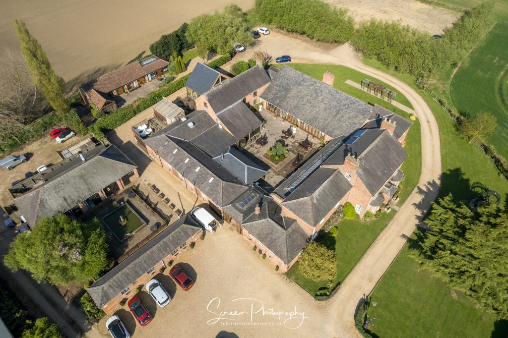 Nottingham Swancar Farm Country House aerial drone image of overall site and Old Stables