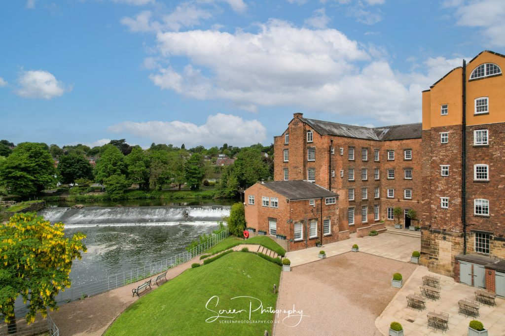 the west mill Darley abbey with weir by drone