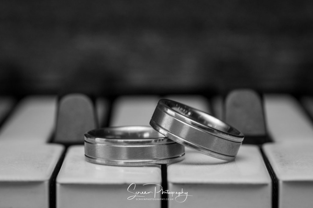 wedding rings on piano wedding photographer Nottingham derby