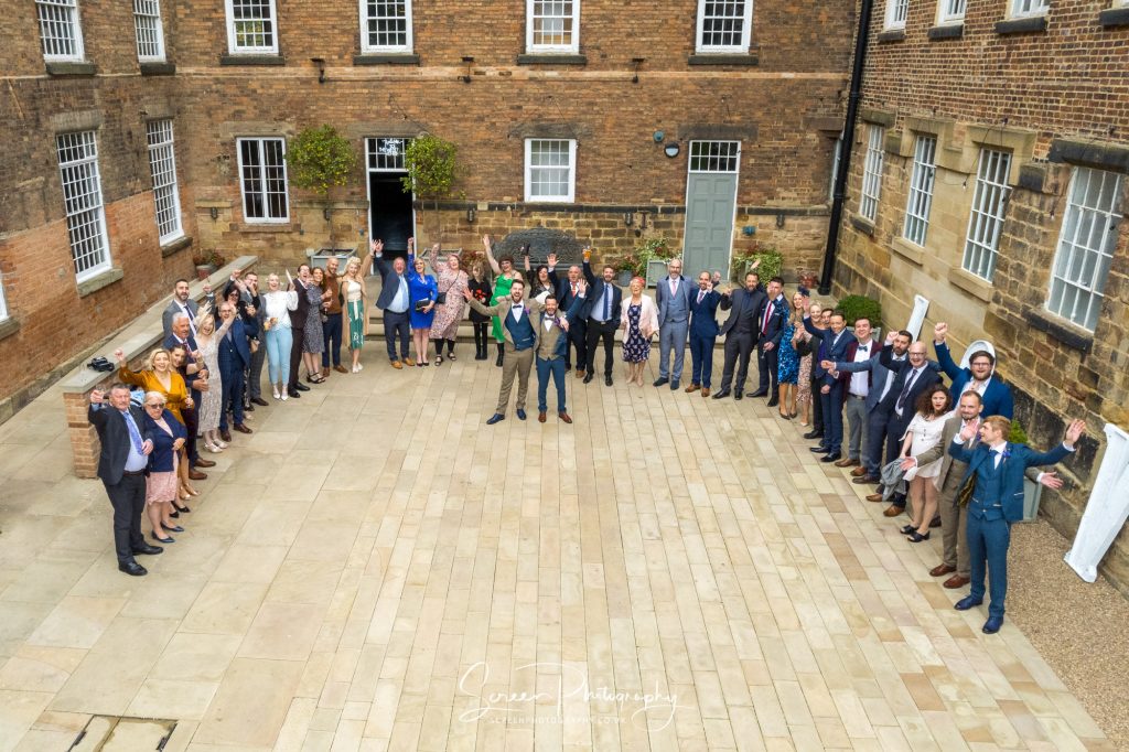west mill group by drone in courtyard