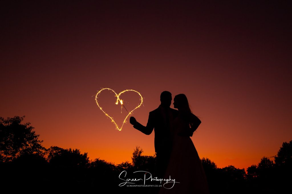 hodsock priory sunset sparkler love heart Nottingham Notts wedding venue 