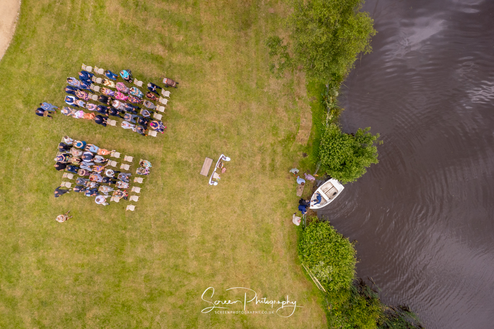 Peak District darwin lake holiday village outside wedding ceremony by drone boat