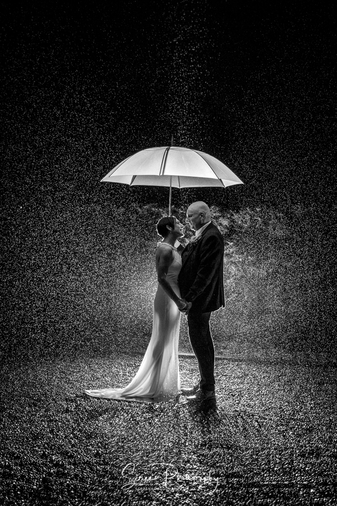 derby conference centre wet rain umbrella wedding day night