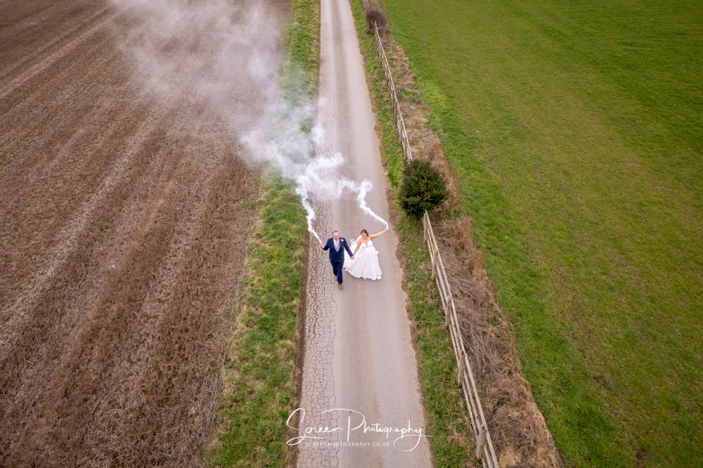 Swancar Farm Country House couple with smoke bomb grenades on drive