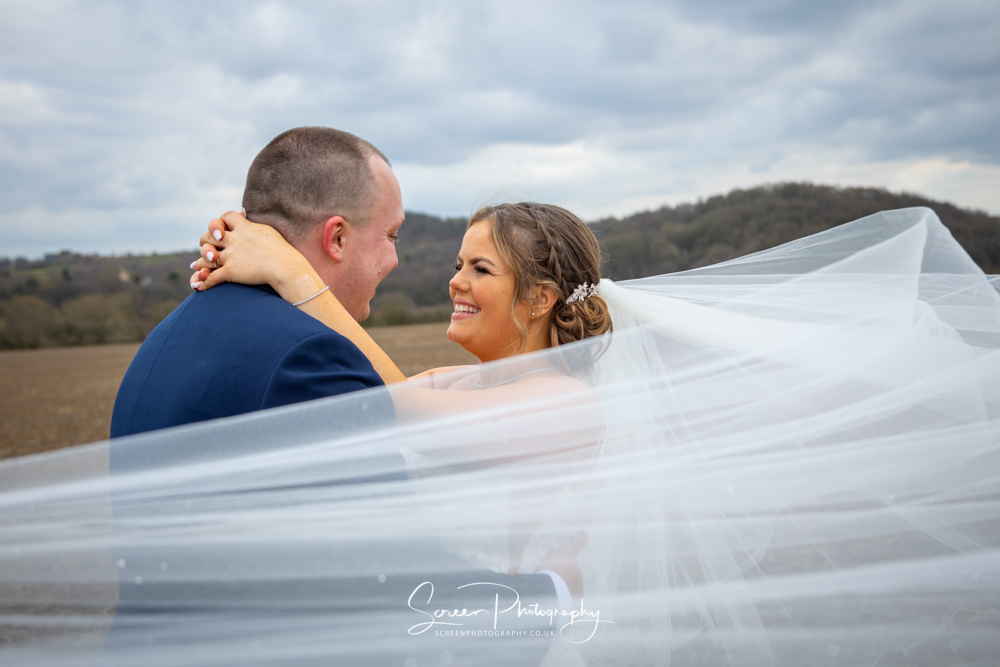 Swancar Farm Country House bride groom veil in wind