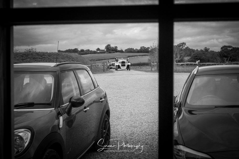 Cripps & Co Grangefields Derby Ashbourne wedding venue barn bride arriving classic cars