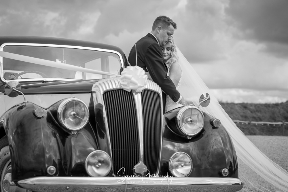 Cripps & Co Grangefields Derby Ashbourne wedding venue barn classic car couple portrait