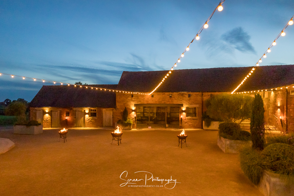 Cripps & Co Grangefields Derby Ashbourne wedding venue barn blue hour dusk courtyard