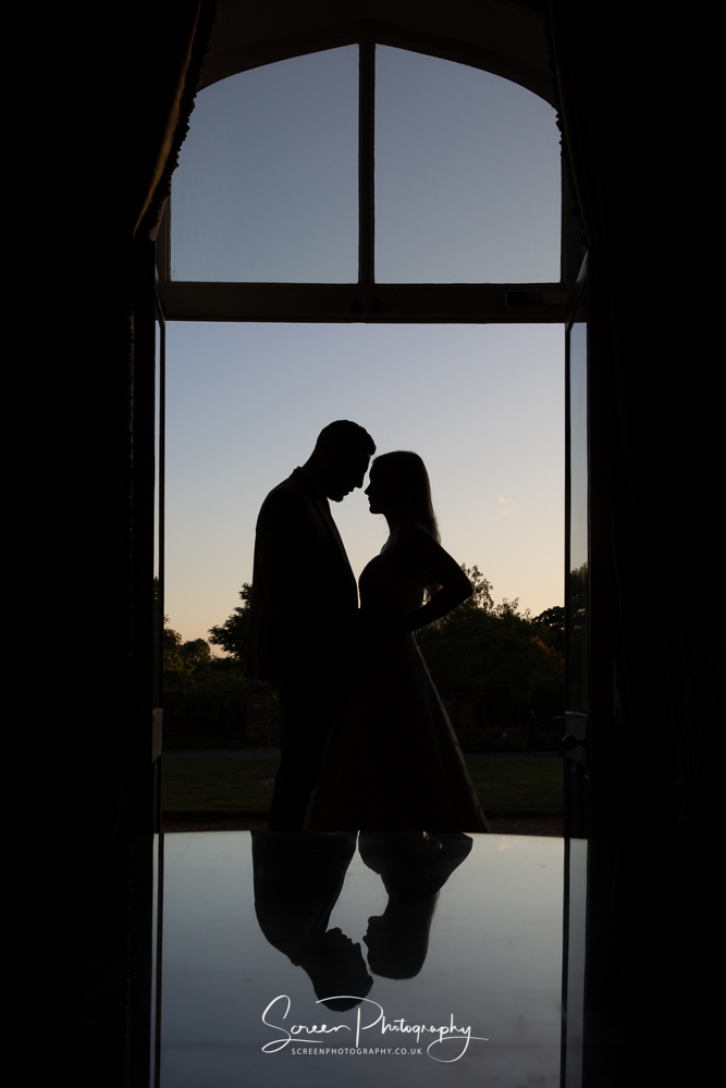 Hodsock Priory silhouette couple bride groom doorway garden sunset Nottingham Notts wedding venue 