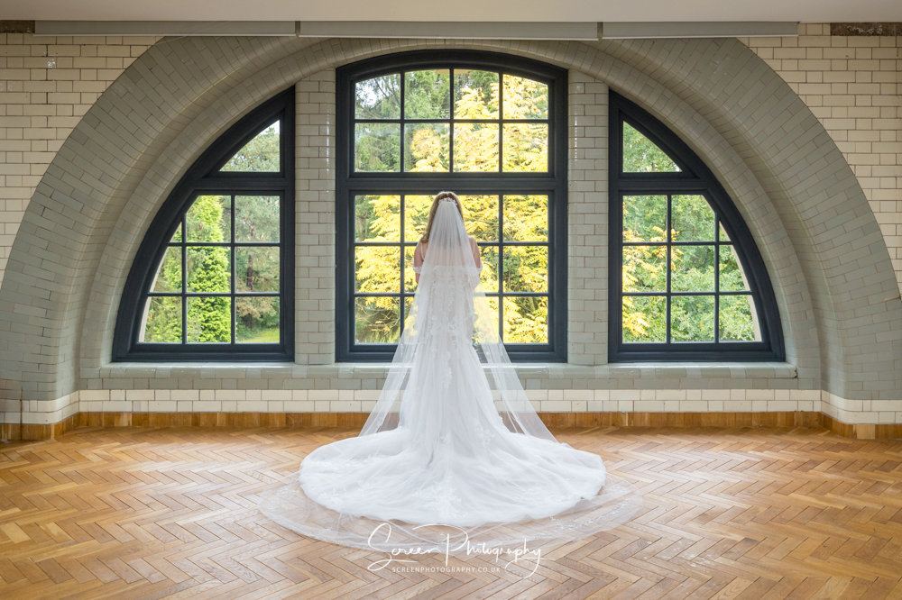 The pumping house Ollerton Nottingham wedding venue bride curved arch window