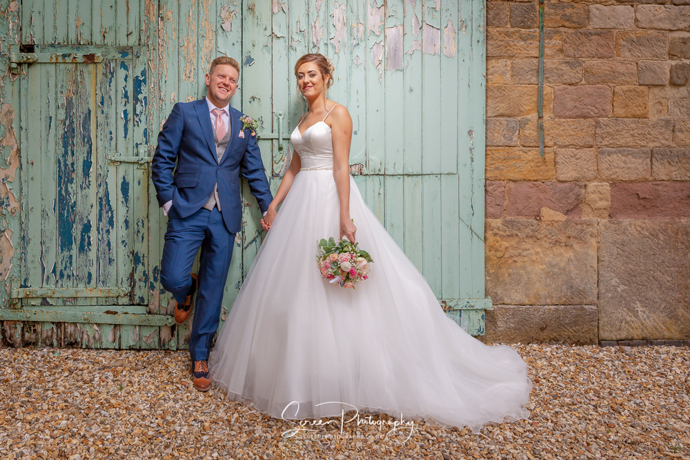 The Shottle Hall Estate Wedding Venue Derby Derbyshire bride groom textured doors