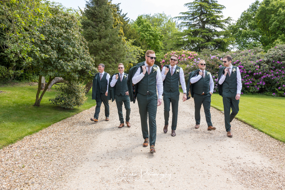 The Shottle Hall Estate Wedding Venue Derby Derbyshire groom party walking