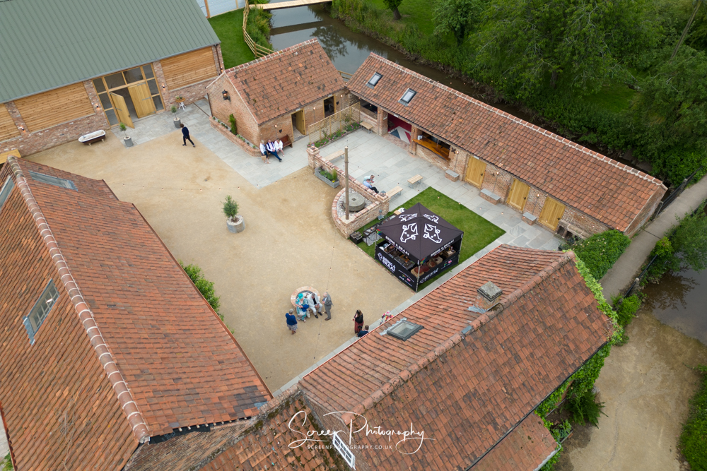 The Mill Hoveringham wedding watermill venue aerial drone of courtyard