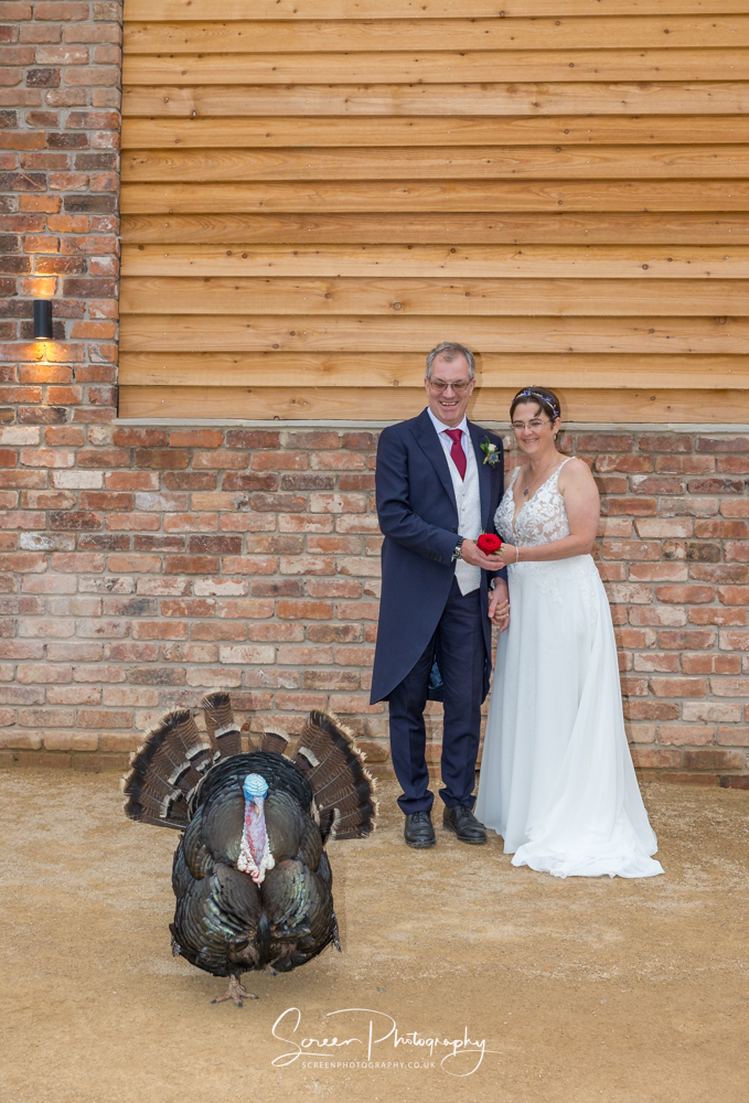 The Mill Hoveringham wedding watermill venue Turkish turkey photobomb couple picture