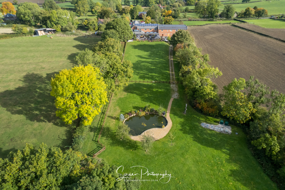 The white hart inn moorwood moor Alfreton wedding venue photography drone rear garden aerial pond