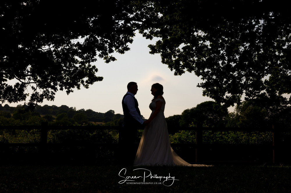 The white hart inn moorwood moor Alfreton wedding venue photography couple bride groom silhouette