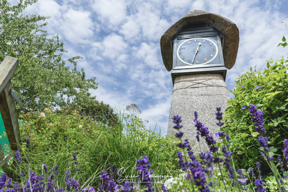 Clock Barn wedding venue Hampshire famous clock and flowers