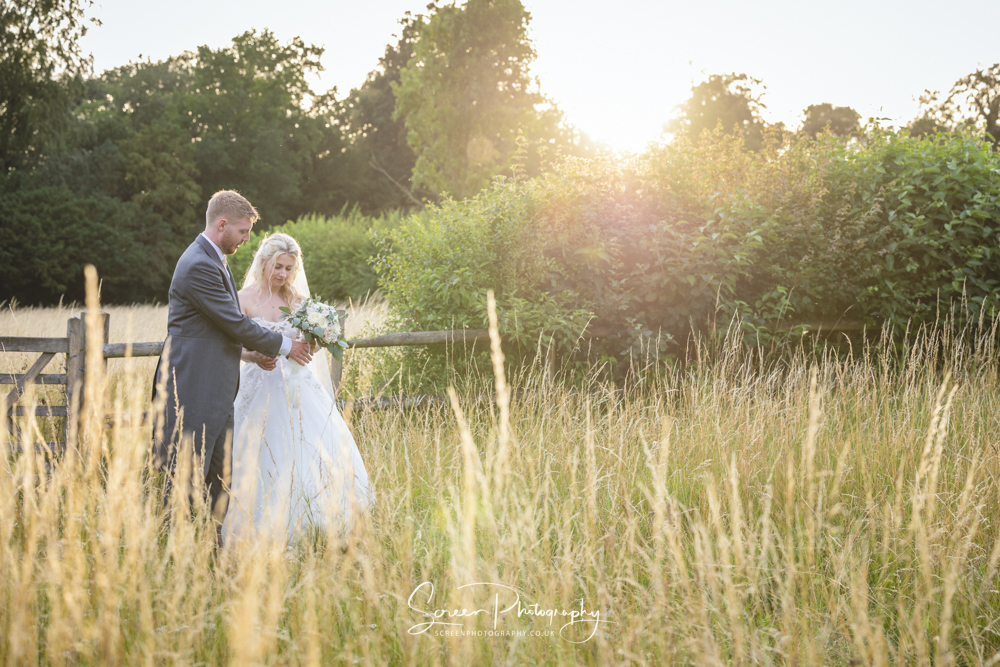 Clock Barn wedding venue Hampshire evening night sun down sunset couple