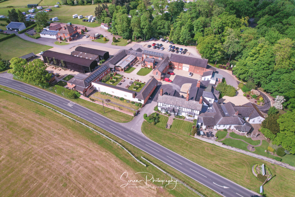Donington Park Farmhouse Barn wedding venue Camp Site aerial Drone View