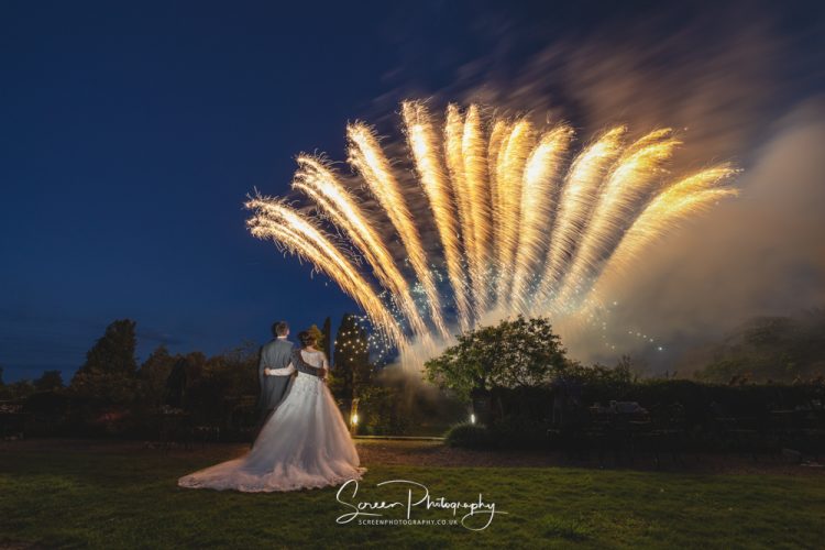 Hodsock priory nottingham worksop married couple bride groom watching fireworks