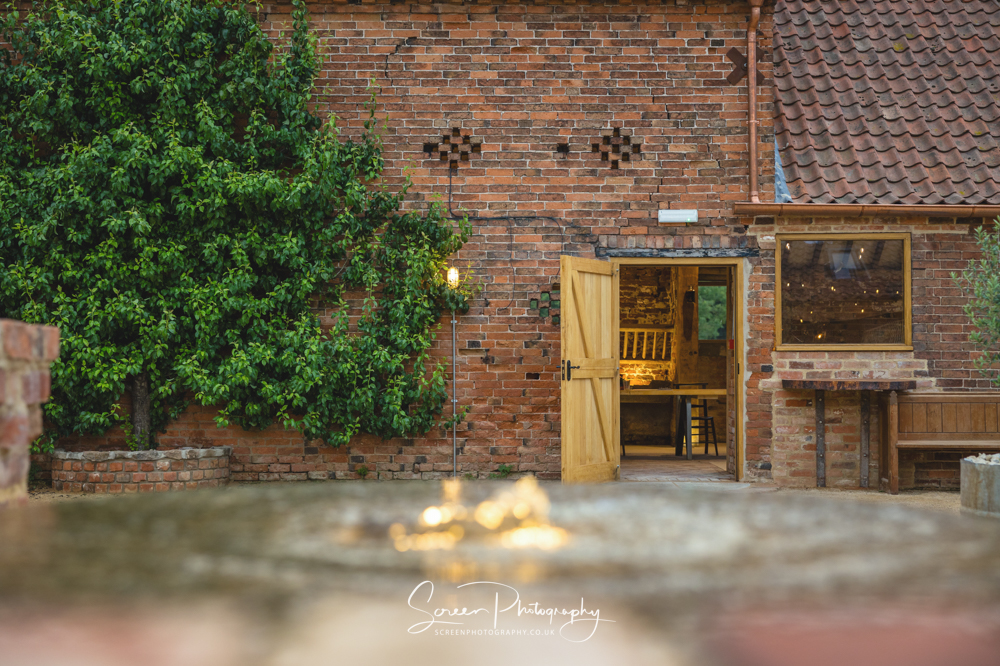 The Mill Hoveringham wedding barn watermill venue with fire pit in nottinghamshire