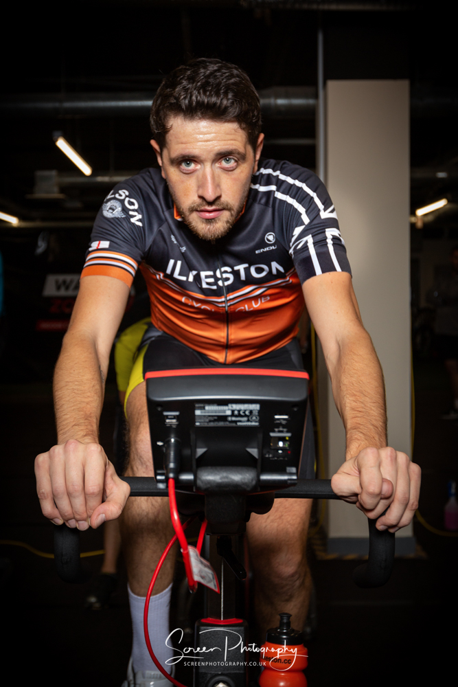 commercial photography nottingham business corporate headshot of a cycling athlete sportsman riding a wattbike