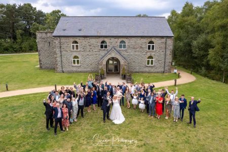 darwin lake wedding photography drone view of all guests cheering