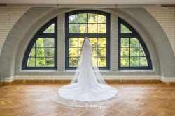 Pumping house ollerton wedding photography bride in window portrait