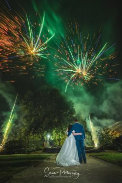 cowlick hall wedding photography married couple bride groom watching fireworks