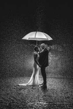 sutton bonington hall wedding photography bride groom creative black white umbrella in rain