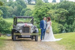 The White Hart Inn Moorwood Moor Derbyshire wedding venue married couple bride groom with classic vintage car