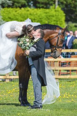 nottingham wedidng photography bride on horse kissing groom