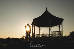 Shottle Hall wedding venue derby Derbyshire married couple bride groom silhouette sunset starburst pagoda pavilion