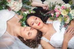 lesbian gay wedding photography two ladies girls lying on the floor