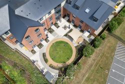 commercial drone nottingham of a residential care home landscaped garden and outdoor seating area