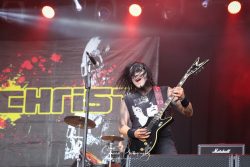 Bloodstock Open Air 2018
Candid of Combichrist commercial photography nottingham combichrist lead guitarist heavy metal bloodstock open air concert with drummer in background