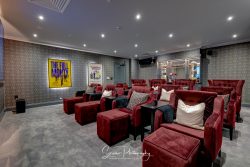 commercial photography nottingham residential care home cinema TV lounge room with the full monty picture on wall
