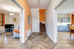 commercial photography nottingham hoiliday cottage showing hall lounge and kitchen for rental airbnb